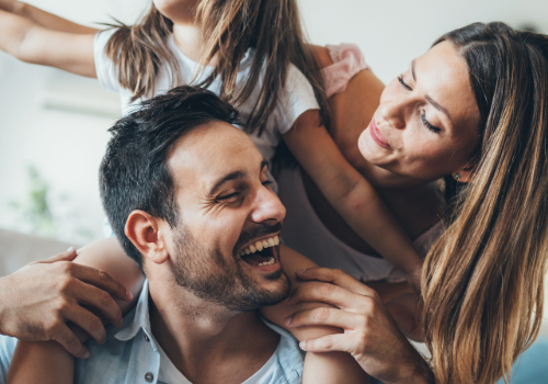 Why Choose Story Roofing for Crawlspace Encapsulation Happy family enjoying time together at home, representing a healthy living environment.